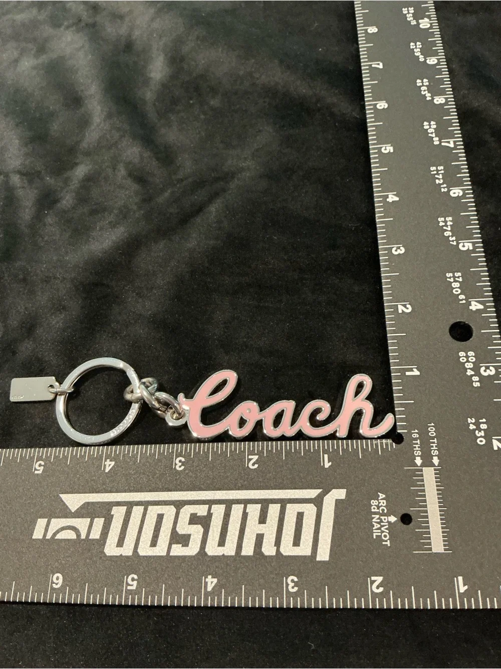 Coach script keychain
